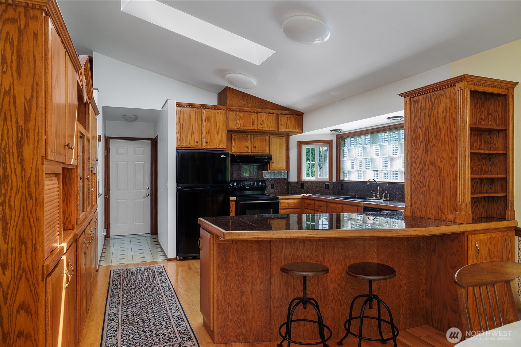 5629 Sleater Kinney Road Northeast Olympia, WA 98506 - Photo 18 of 32 a dining room with furniture and a window