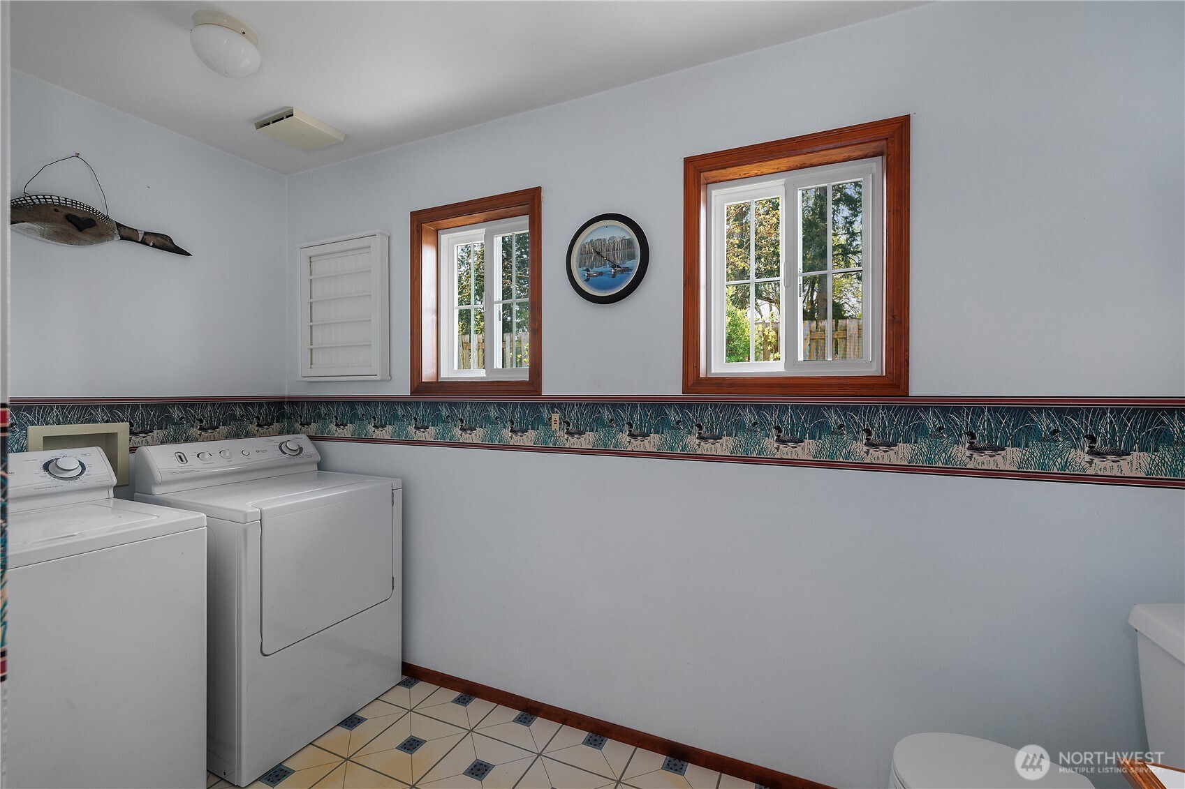 5629 Sleater Kinney Road Northeast Olympia, WA 98506 - Photo 19 of 32 a bathroom with a sink and a toilet