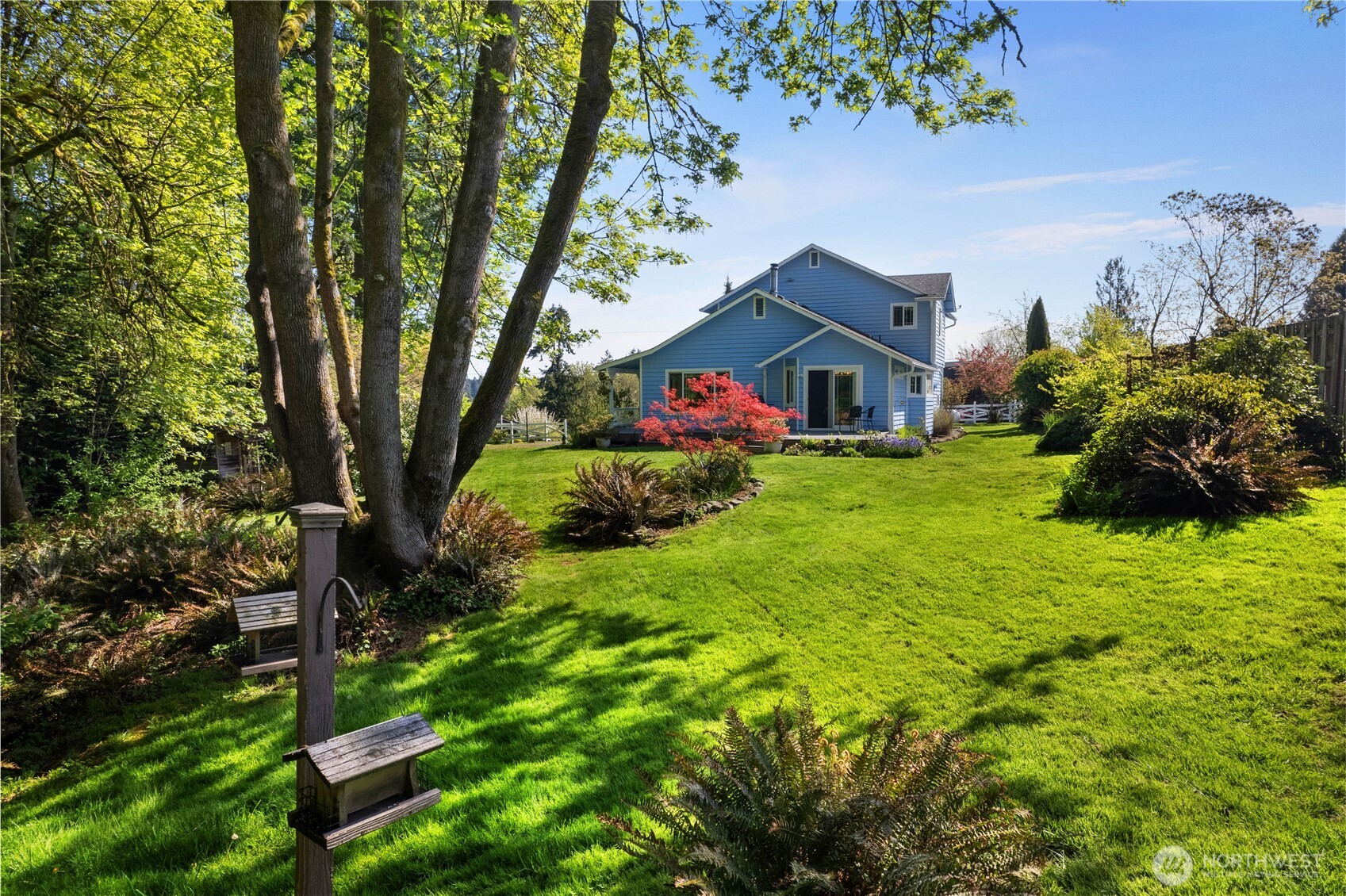 5629 Sleater Kinney Road Northeast Olympia, WA 98506 - Photo 27 of 32 a front view of a house with garden