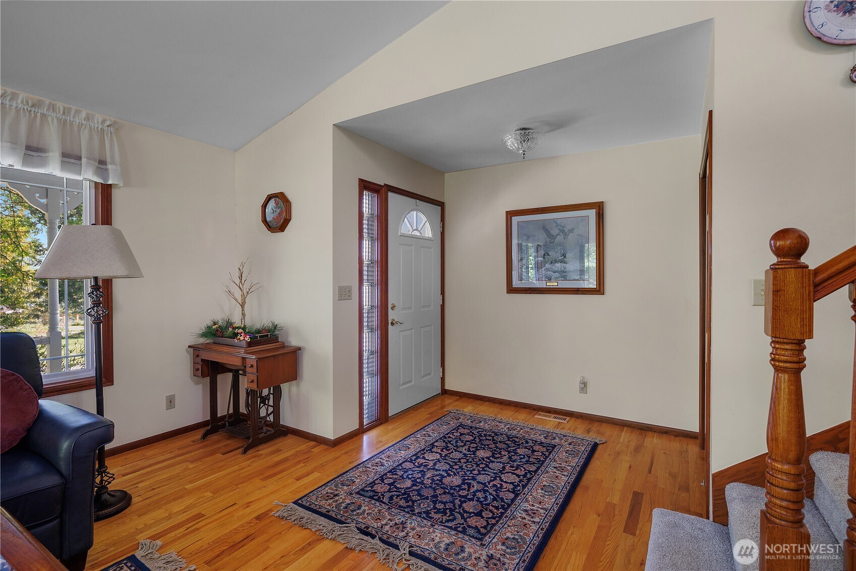 5629 Sleater Kinney Road Northeast Olympia, WA 98506 - Photo 8 of 32 a living room with furniture rug and a window