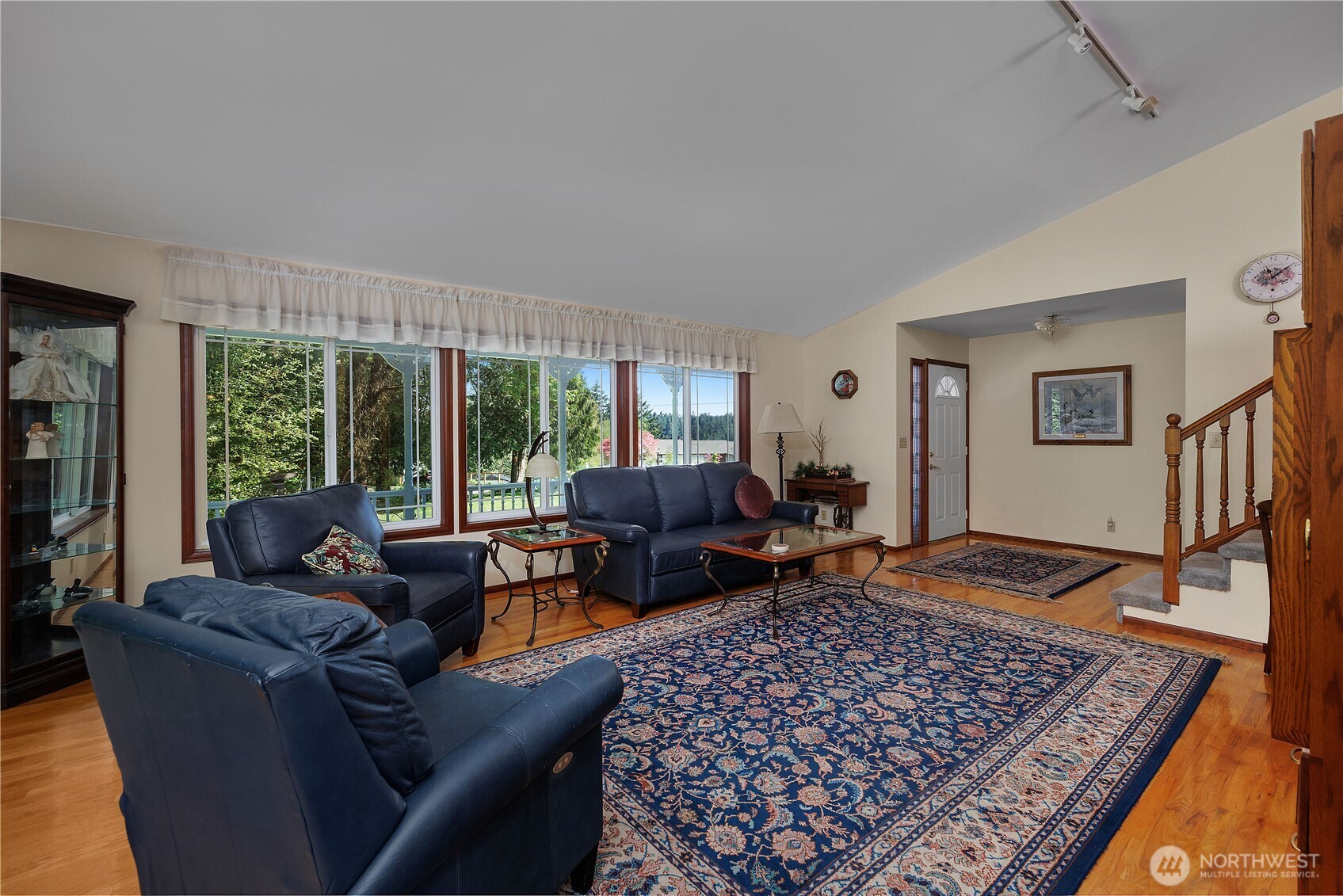 5629 Sleater Kinney Road Northeast Olympia, WA 98506 - Photo 10 of 32 a living room with furniture and a rug