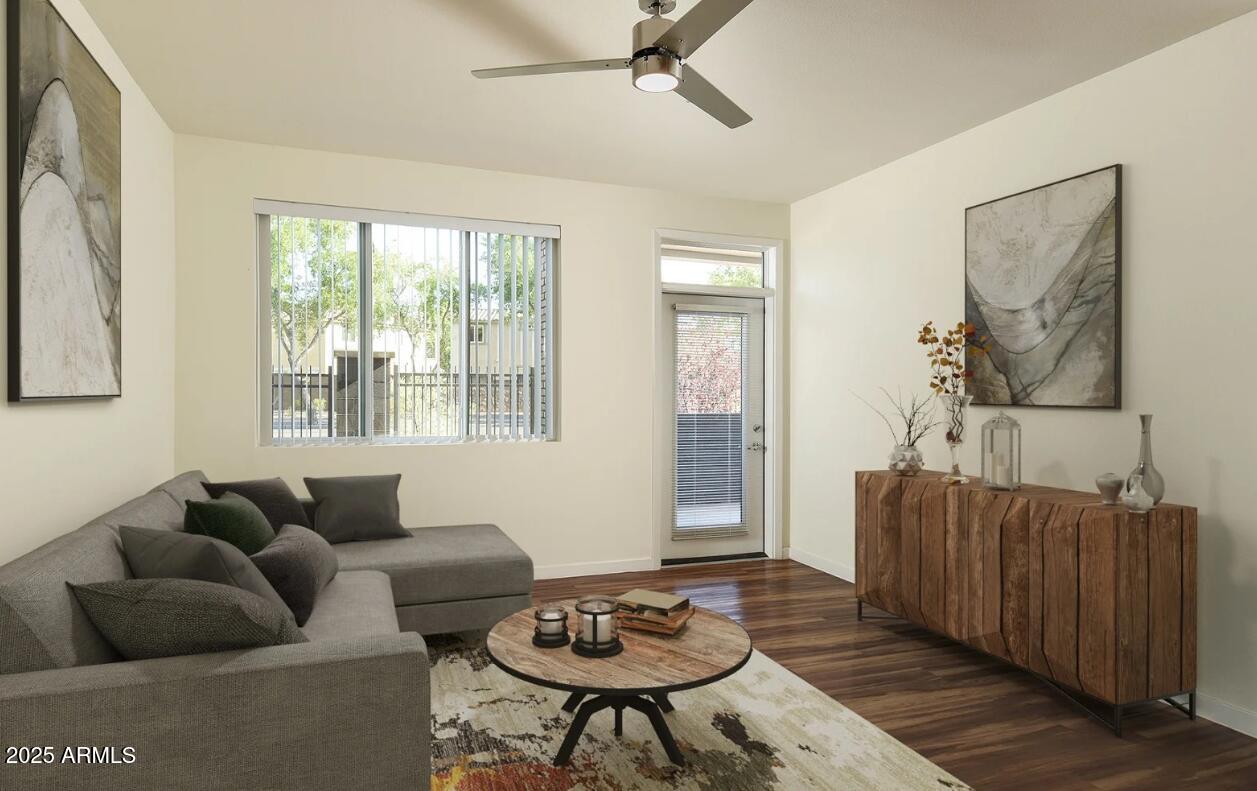 7800 West Encanto Boulevard, Unit 3 Phoenix, AZ 85035 - Photo 2 of 15 a living room with furniture and a window