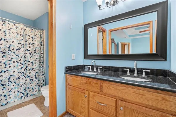 $305,000 | 448 Southwest Laura Lane, Grain Valley, MO 64029