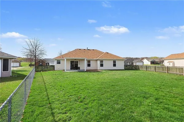 $305,000 | 448 Southwest Laura Lane, Grain Valley, MO 64029