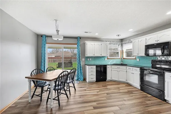 $305,000 | 448 Southwest Laura Lane, Grain Valley, MO 64029