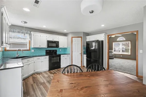 $305,000 | 448 Southwest Laura Lane, Grain Valley, MO 64029