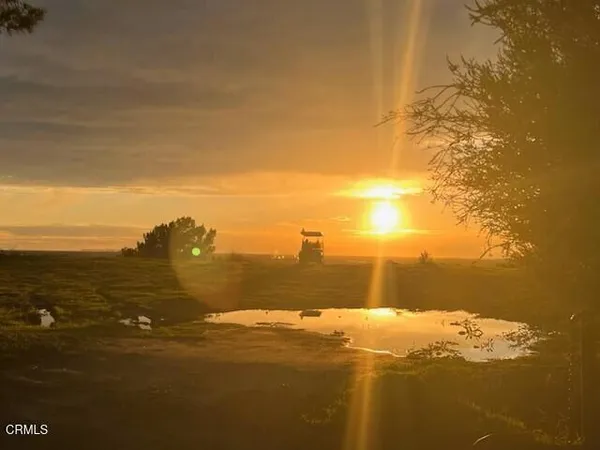 a view of a balcony and a kitchen