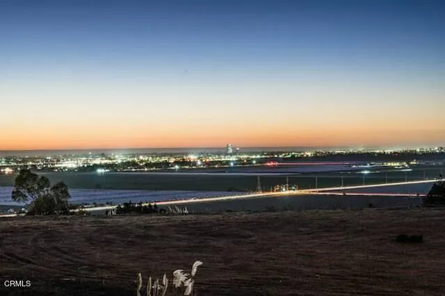 a view of a lake with houses