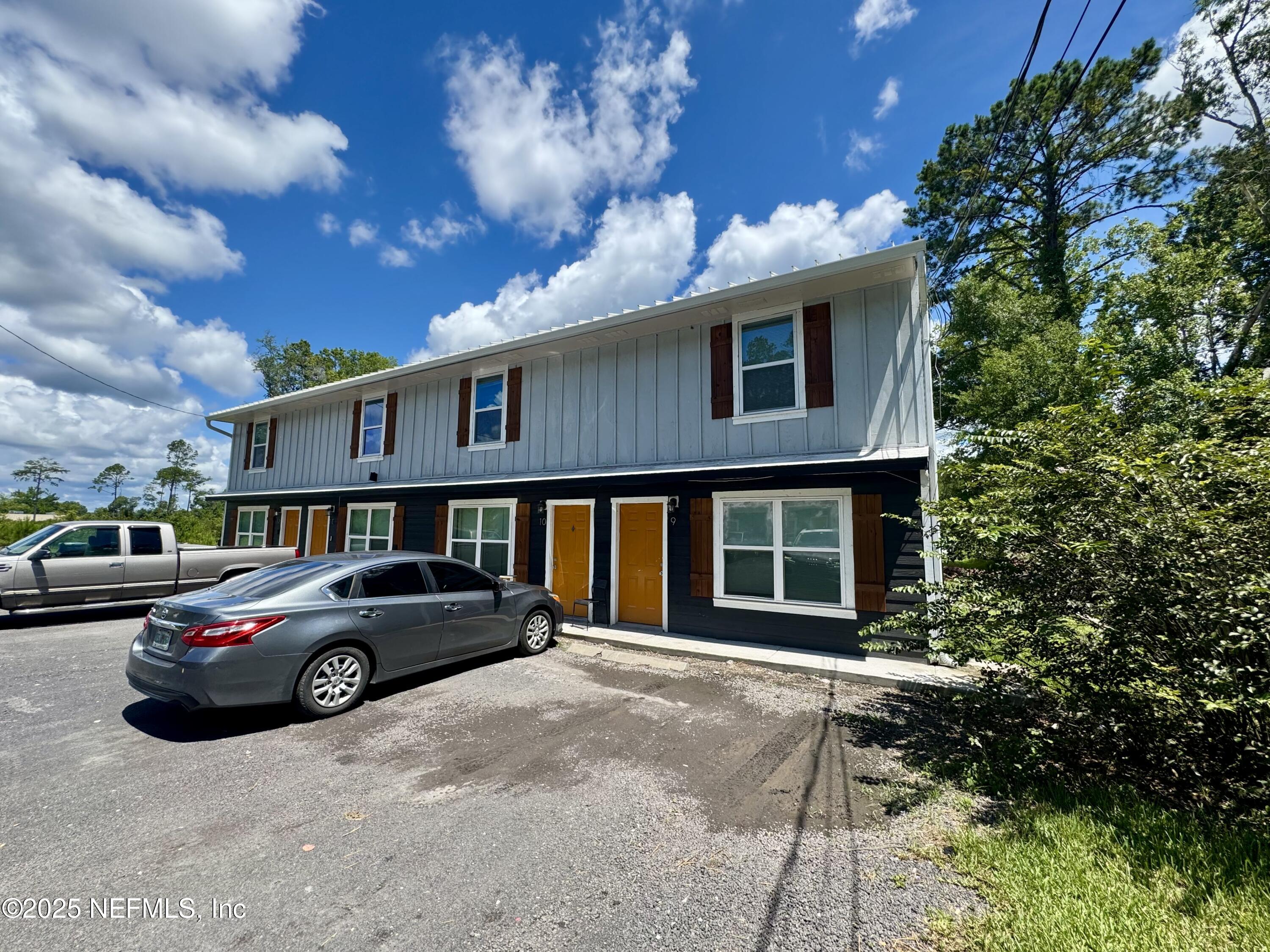a car parked in front of a house
