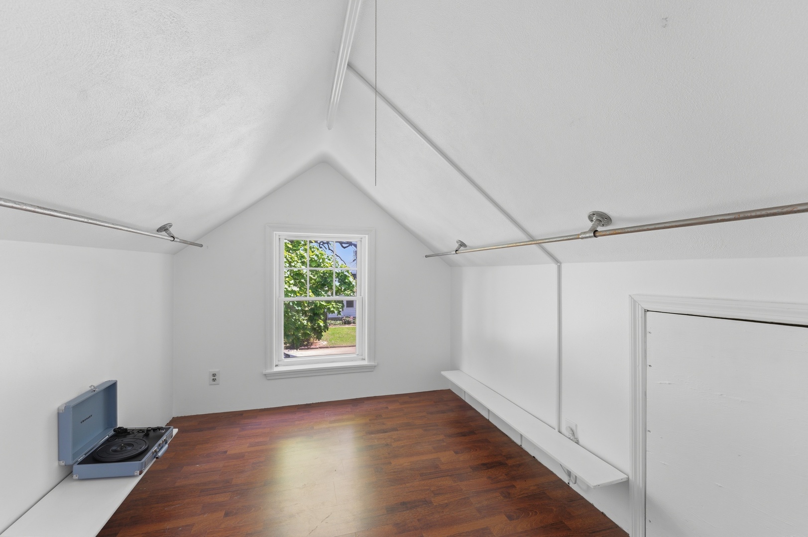 2405 31st Street Moline, IL 61265 - Photo 19 of 24 a view of an empty room with wooden floor and a window