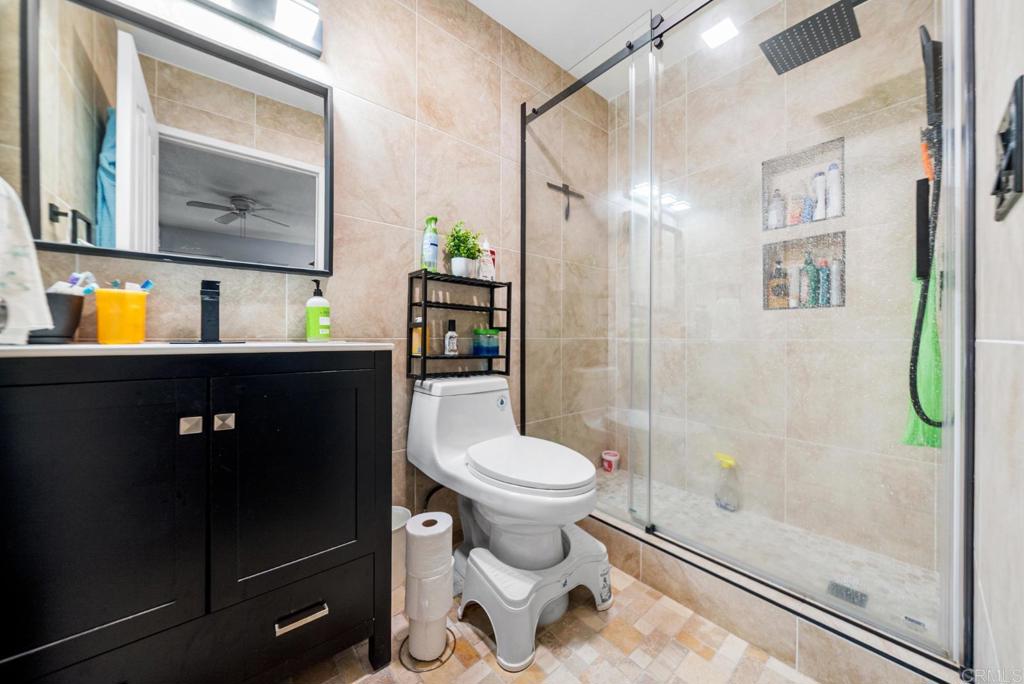 500 Telegraph Canyon Road, Unit H Chula Vista, CA 91910 - Photo 22 of 36 a bathroom with a sink toilet and shower