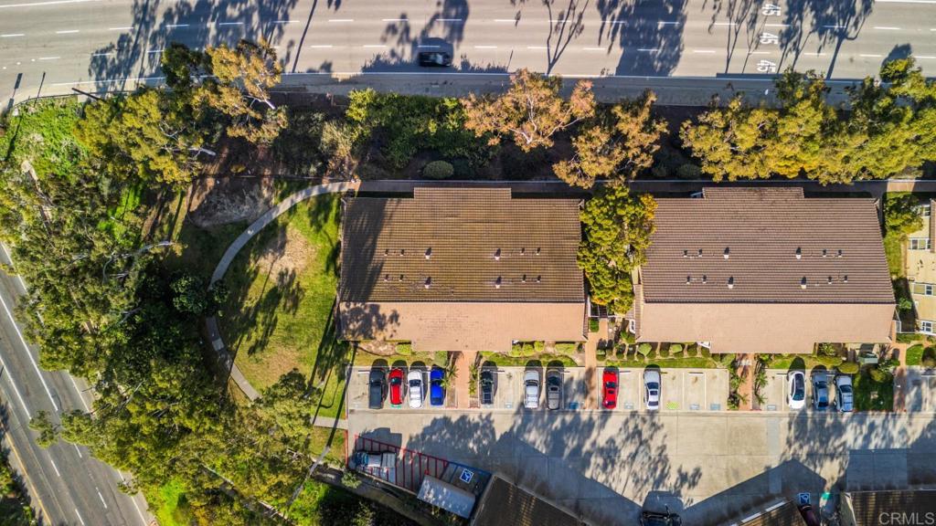 500 Telegraph Canyon Road, Unit H Chula Vista, CA 91910 - Photo 29 of 36 an aerial view of a house with a yard and sitting area