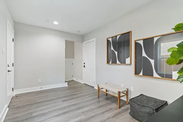 a view of livingroom with furniture and wooden floor
