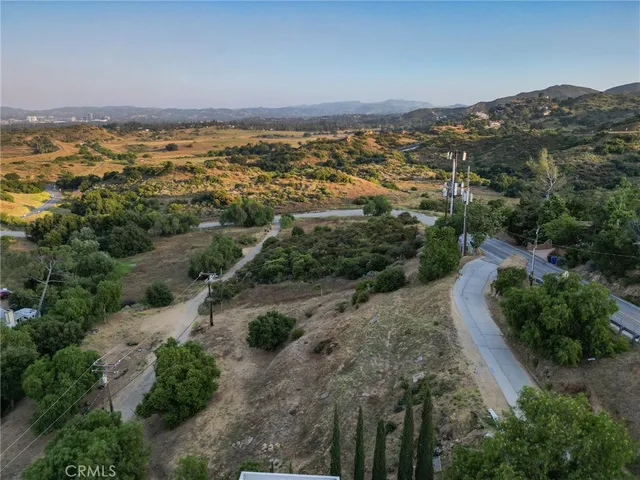 an aerial view of residential building and green space