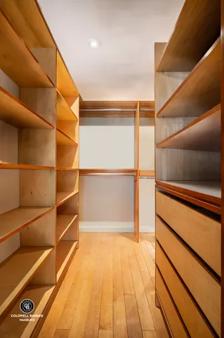 a bathroom with a sink double vanity and a toilet