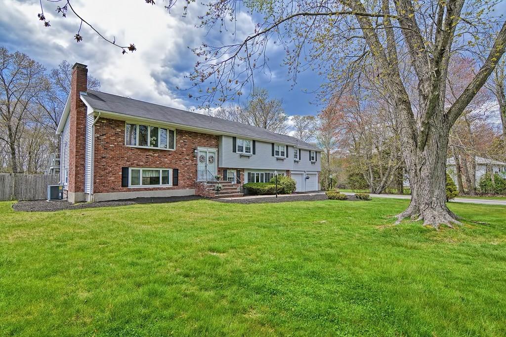 50 Cedarcrest Road Canton, MA 02021 - Photo 1 of 42 a house view with a garden space