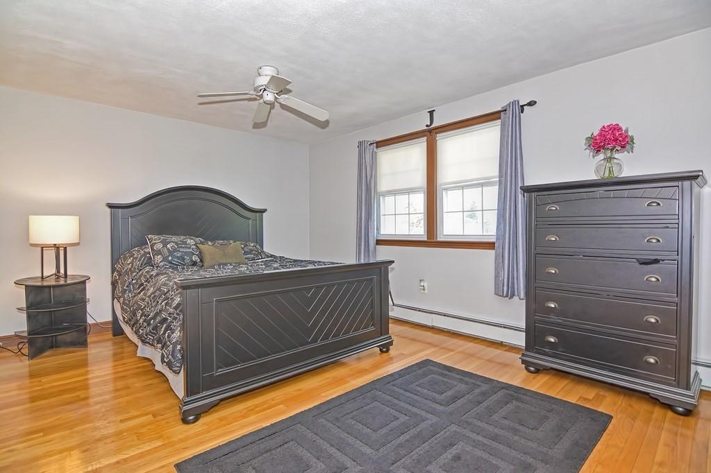 50 Cedarcrest Road Canton, MA 02021 - Photo 16 of 42 a bedroom with a bed and a dresser