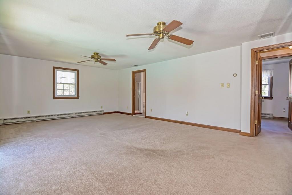 50 Cedarcrest Road Canton, MA 02021 - Photo 24 of 42 a view of a livingroom with a ceiling fan and window