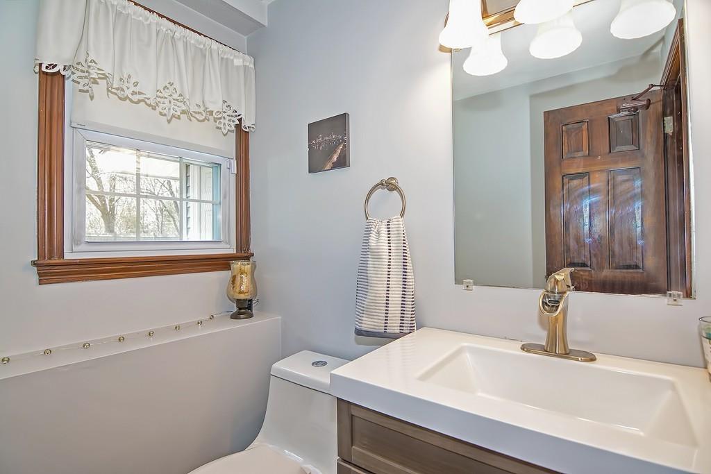 50 Cedarcrest Road Canton, MA 02021 - Photo 31 of 42 a bathroom with a sink a toilet and a mirror