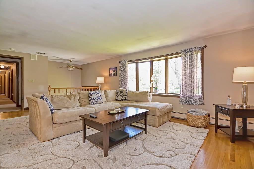 50 Cedarcrest Road Canton, MA 02021 - Photo 4 of 42 a living room with furniture and a wooden floor