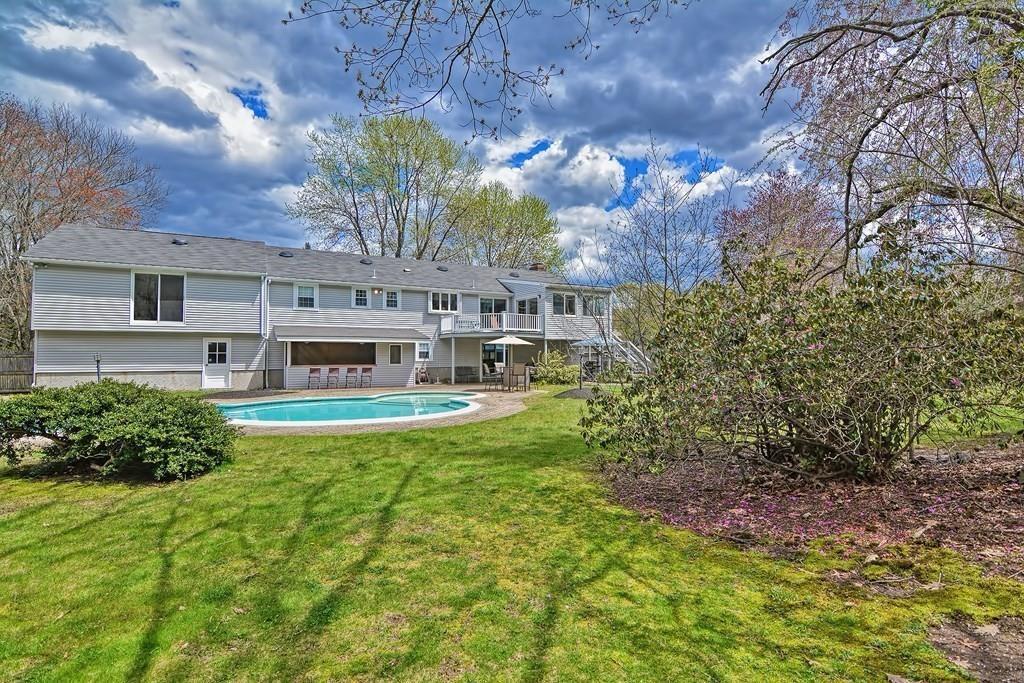 50 Cedarcrest Road Canton, MA 02021 - Photo 42 of 42 a view of a house with a big yard potted plants and large tree