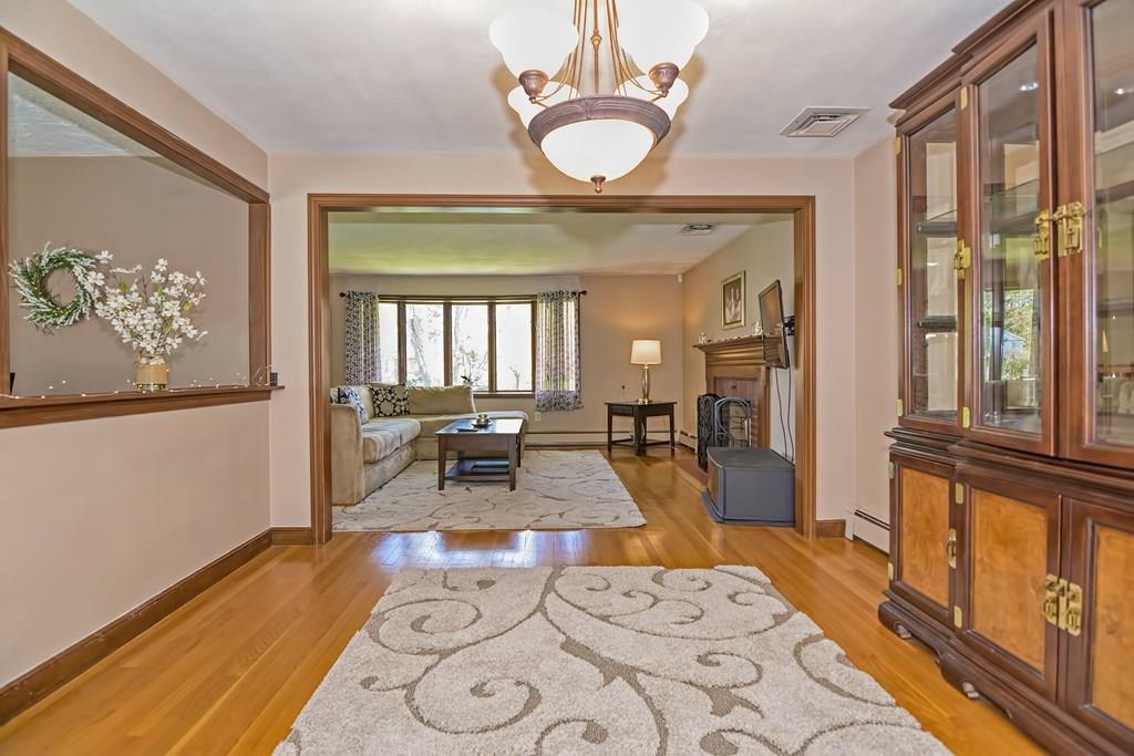 50 Cedarcrest Road Canton, MA 02021 - Photo 7 of 42 a living room with furniture and a large window