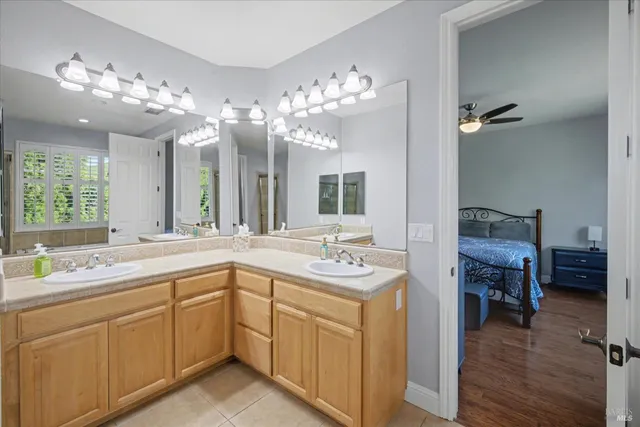 a view of a swimming pool with a lounge chair and swimming pool