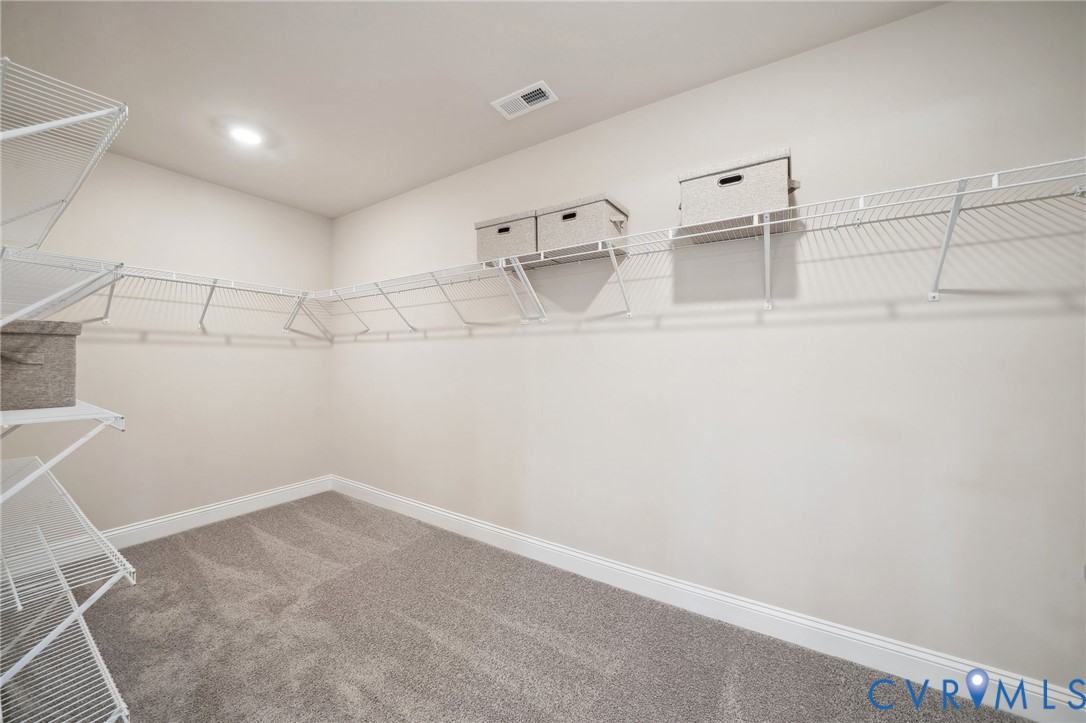 16800 Barmer Road Chesterfield, VA 23832 - Photo 18 of 28 a view of a room with racks on the wall