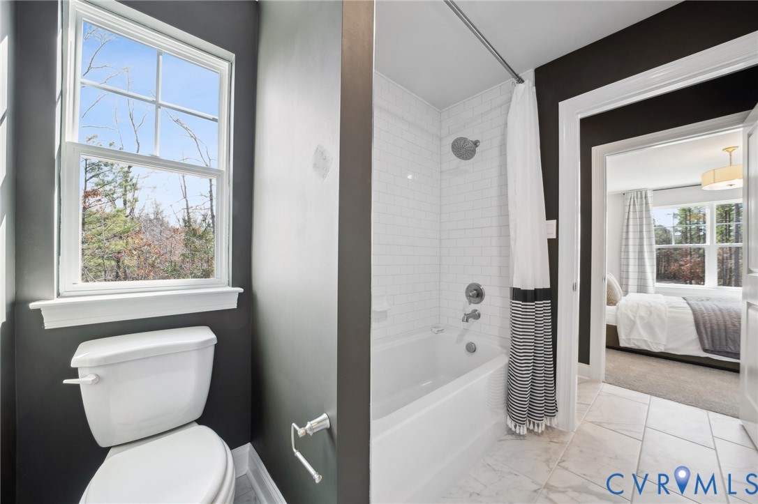 16800 Barmer Road Chesterfield, VA 23832 - Photo 20 of 28 a bathroom with a toilet tub and shower