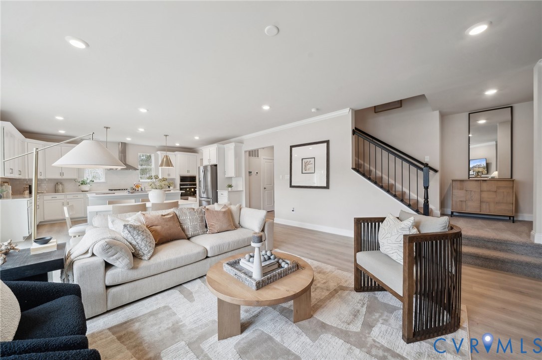 16800 Barmer Road Chesterfield, VA 23832 - Photo 2 of 28 a living room with furniture kitchen view and a wooden floor