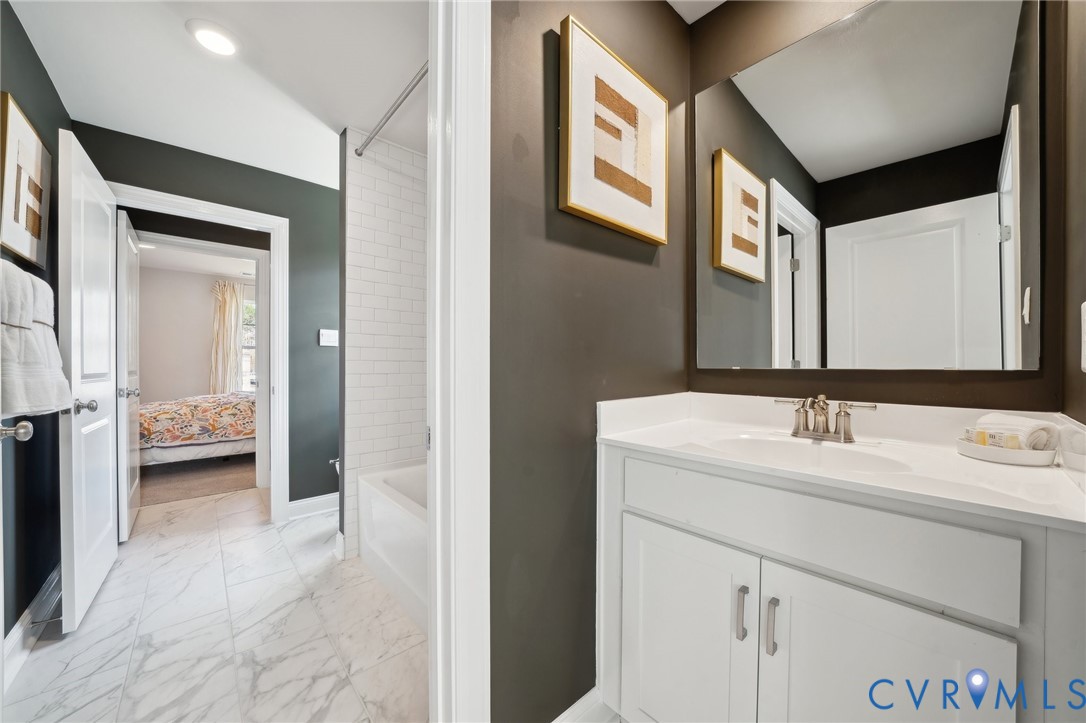 16800 Barmer Road Chesterfield, VA 23832 - Photo 21 of 28 a bathroom with a sink and a mirror