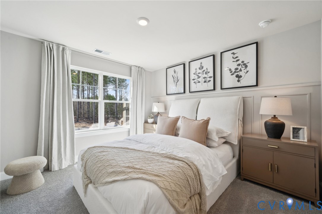 16800 Barmer Road Chesterfield, VA 23832 - Photo 24 of 28 a bedroom with a large bed and a window