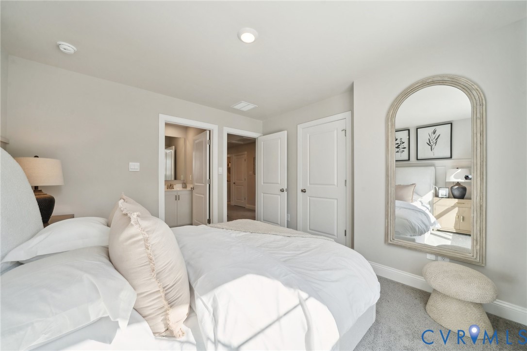 16800 Barmer Road Chesterfield, VA 23832 - Photo 25 of 28 a bedroom with a bed and a view of bathroom