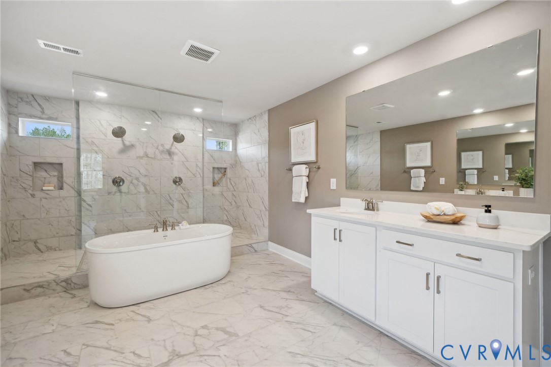 16800 Barmer Road Chesterfield, VA 23832 - Photo 10 of 28 a bathroom with a double vanity sink mirror bathtub and shower