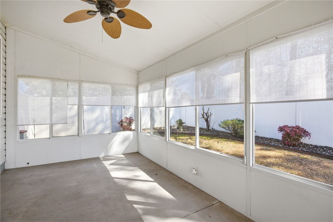 201 Providence Court Seneca, SC 29678 - Photo 26 of 33 This bright sunroom offers a serene retreat with expansive views of the private yard.