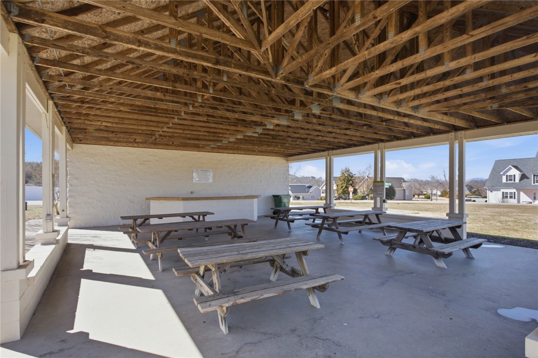 201 Providence Court Seneca, SC 29678 - Photo 32 of 33 This spacious outdoor covered area offers an inviting space for gatherings.