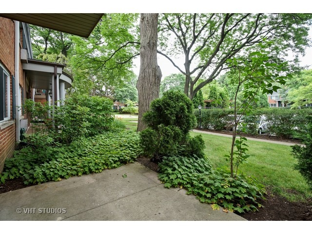 2315 South Goebbert Road, Unit D106 Arlington Heights, IL 60005 - Photo 10 of 11 a view of outdoor space and yard