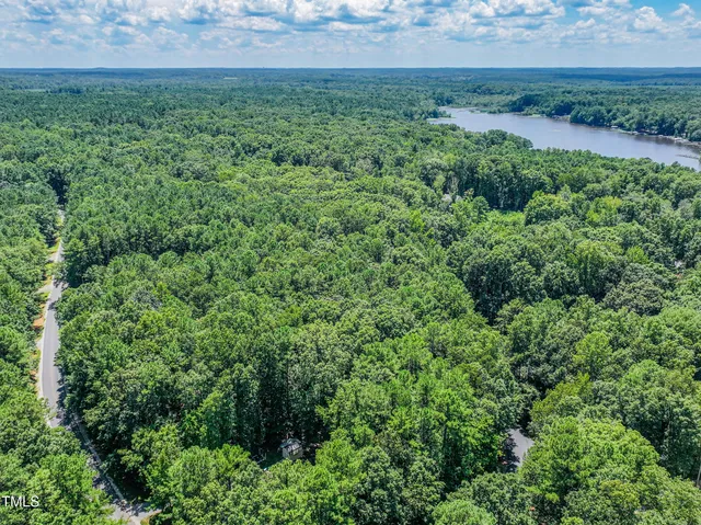 an aerial view of residential house with outdoor space