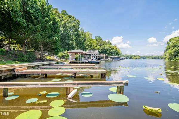 a view of a swimming pool with outdoor seating