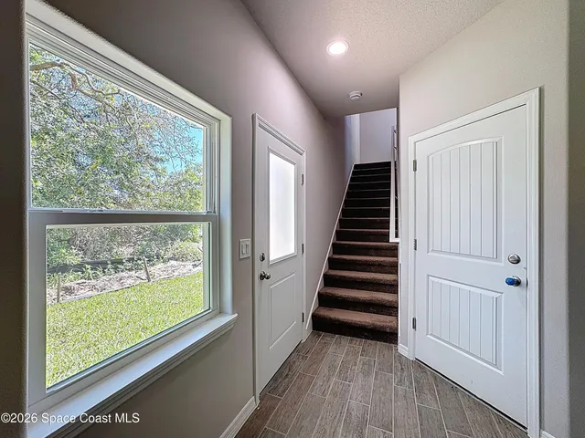 a view of a room with racks on the wall