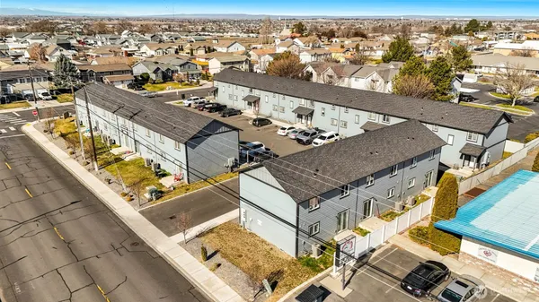 an aerial view of a house with a ocean view