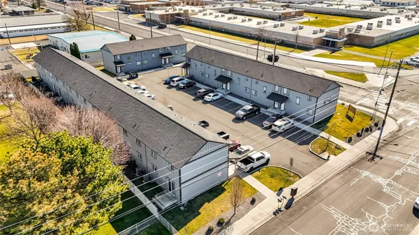 an aerial view of a house with a ocean view