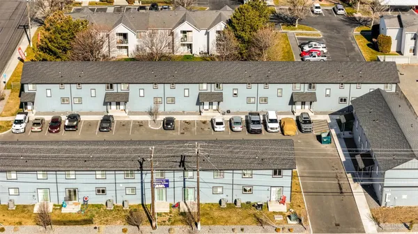 a view of building with cars