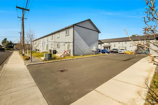 a view of swimming pool with outdoor seating