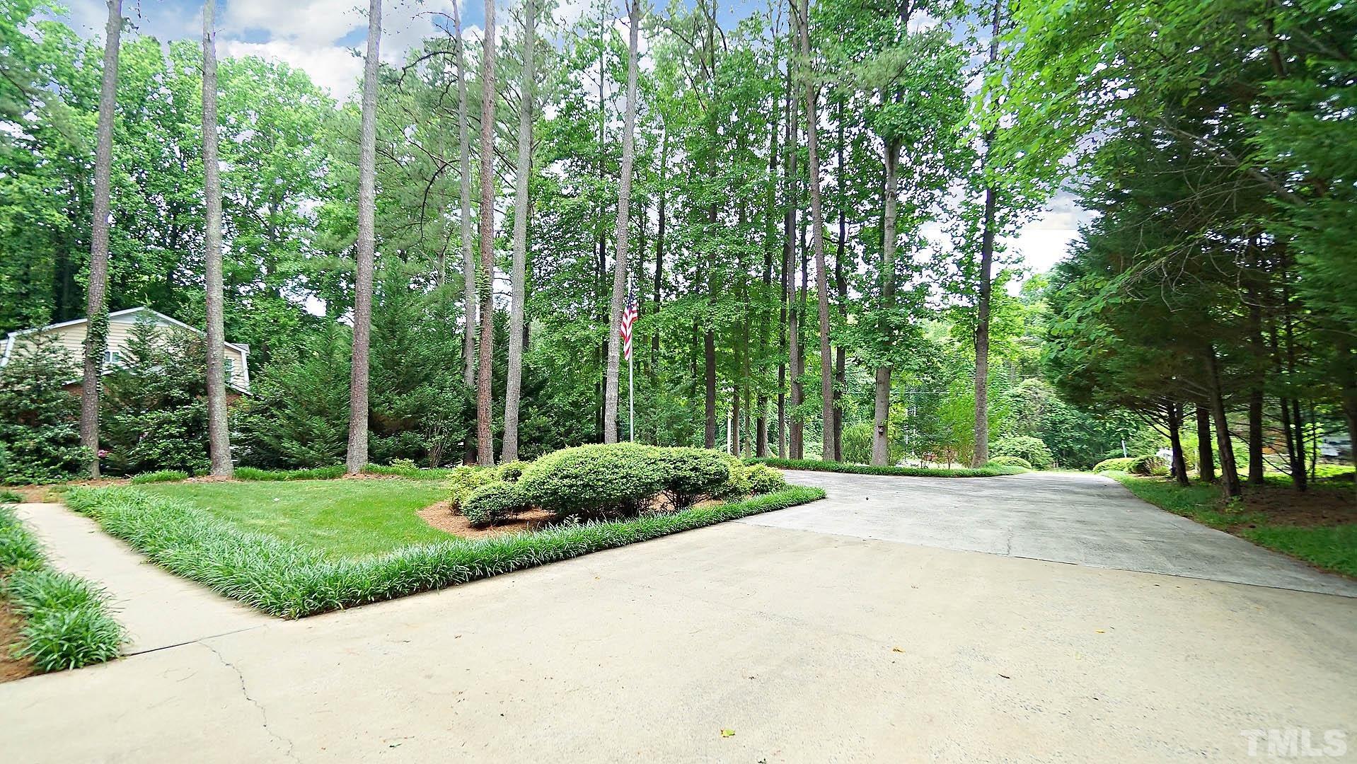 5706 Russell Road Durham, NC 27712 - Photo 1 of 20 a view of a park with a trees