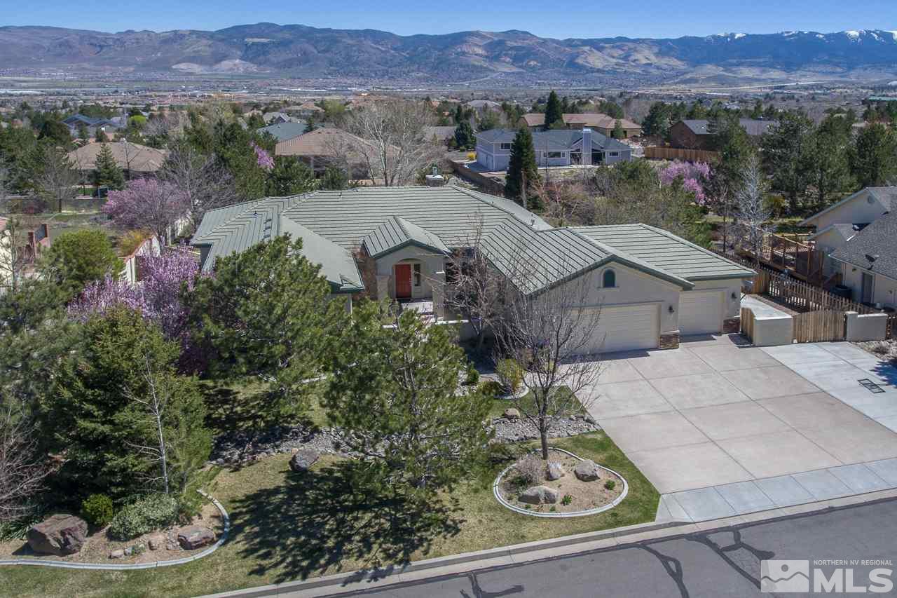 40 Calla Lily Court Reno, NV 89511 - Photo 1 of 1 an aerial view of a house with a garden