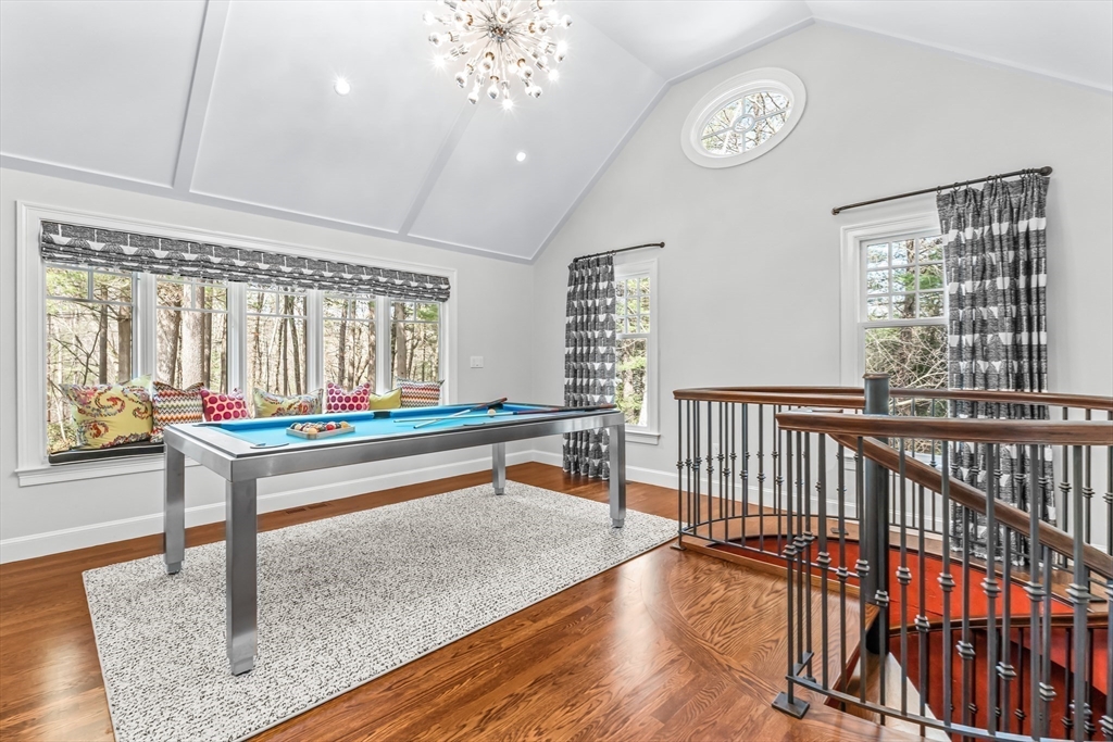 22 Chadwick Road Weston, MA 02493 - Photo 11 of 33 a bedroom with furniture window and wooden floor