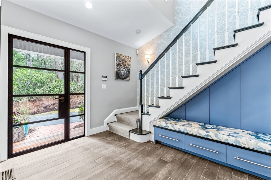 22 Chadwick Road Weston, MA 02493 - Photo 13 of 33 a view of entryway and hall with wooden floor