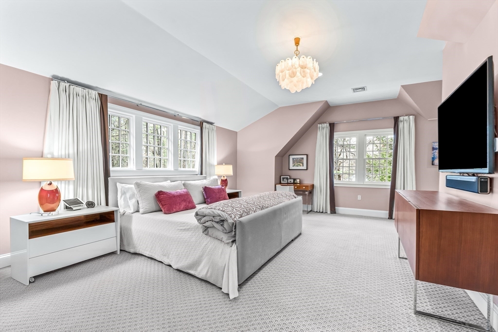 22 Chadwick Road Weston, MA 02493 - Photo 16 of 33 a living room with furniture and a flat screen tv