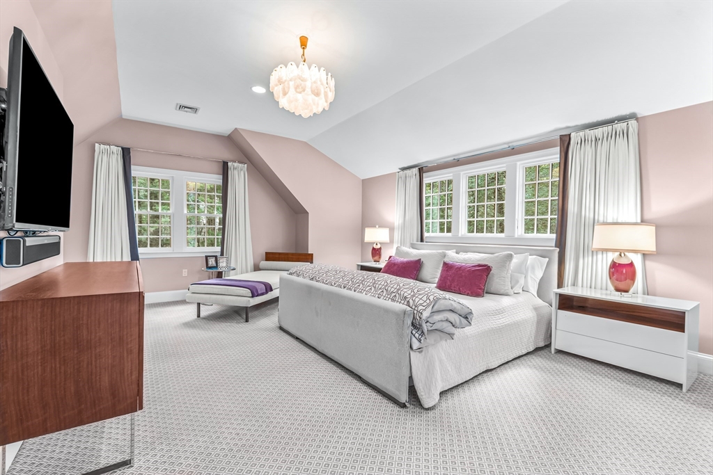 22 Chadwick Road Weston, MA 02493 - Photo 17 of 33 a living room with furniture and a flat screen tv